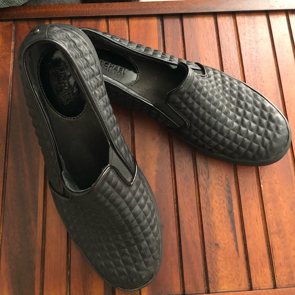 Michael Kors all black slip on shoes
